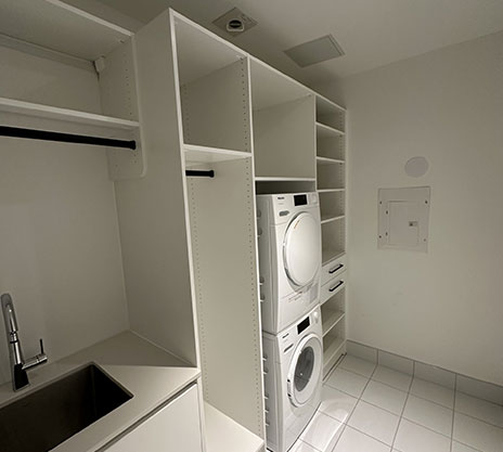 Laundry, mudroom, entertainment and living spaces